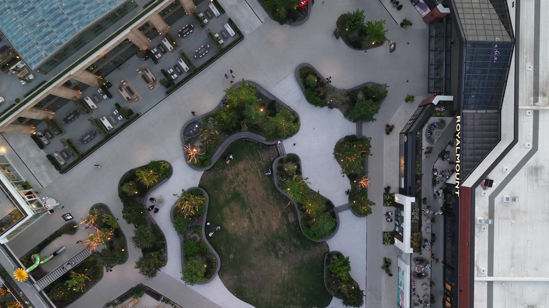 Landscaped urban plaza from above at dusk